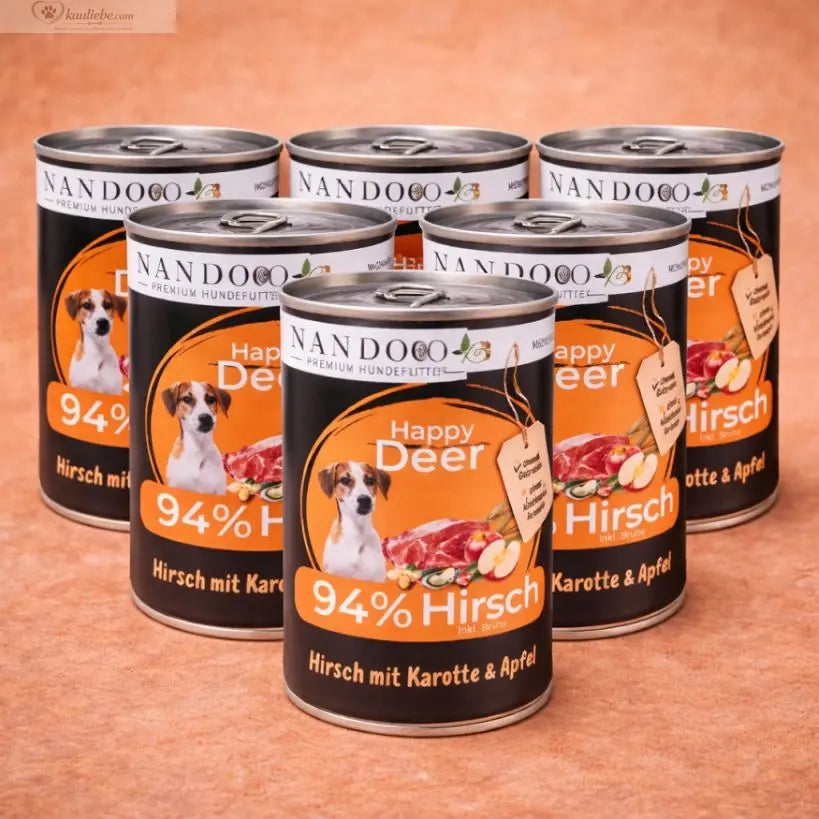 Sechs Dosen Nassfutter für Hunde mit Hirsch, Karotte, Apfel und Grünlippmuschel von NANDOO, naturbelassen und nahrhaft.