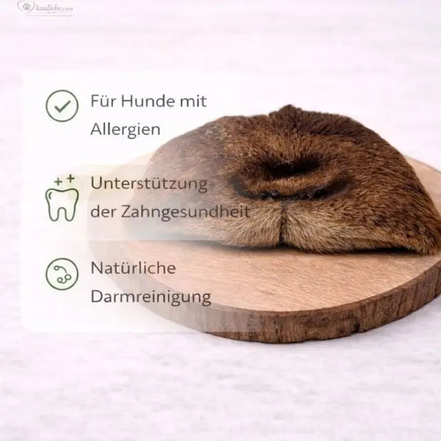 Ziegennase mit Fell, 250g, von NANDOO, zeigt detaillierte Textur des Ziegenfells und Naturmaterial für Tierbedarf.